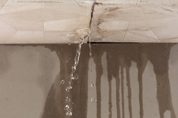 Professional Flood Damage Cleanup technician working in Durham, NC
